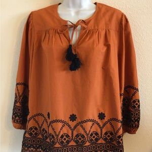 Chico's Burnt Orange Blouse with Tie Detail and black embroidery